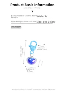 Detail view of transparent jelly heart pendant keychain with blue clip weighing 5g