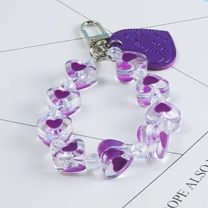 Purple acrylic heart chain keychain with metallic clasp and leatherette heart tag