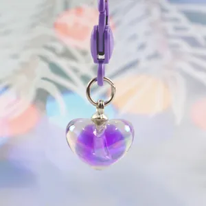 Cute purple heart keychain with translucent iridescent pendant and silver metal ring