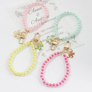 Colorful butterfly beaded keychains with acrylic pearls and gold lobster clasps