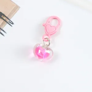 Detail of pink jelly heart charm with matching lobster clasp for bags and keyrings