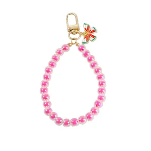 Pink butterfly charm beaded keychain with colorful acrylic pearls and gold lobster clasp
