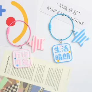 Cute star keychain with artistic Chinese character charms and colorful wire ring