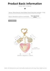 Macro detail of vintage keychain with pink glitter heart and gold alloy pendants