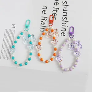 Portachiavi con perline, cuori e fiocchi in rosa, arancione e viola per borse e chiavi