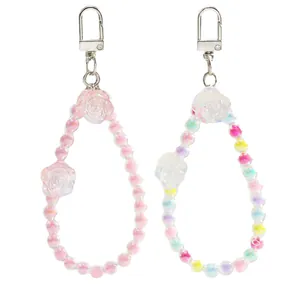 Beaded crystal flower keychains with pink and colorful macaron beads and silver ring