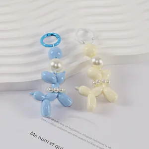 Creative resin balloon dog keychains with pearl necklaces in sky blue and cream white