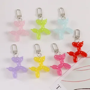 Detailed close-up of jelly texture balloon dog keychains in seven assorted vibrant colors