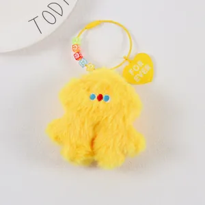 Yellow plush keychain with colorful smiley beads and a heart-shaped tag marked For Ever