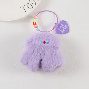 Detail of purple plush keychain with colorful smiley beads and a heart Forever charm