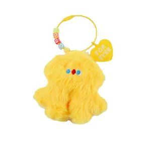 Cute yellow plush keychain with colorful beads and a heart-shaped tag for bags