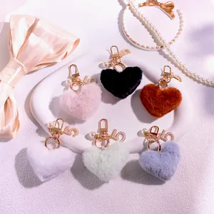 Plush heart keychains with faux fur, pearl charms and number 5 pendants in 6 colors