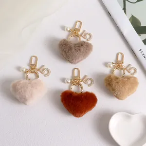 Plush heart keychains with pearls and number 5 charms in beige, brown and coffee colors