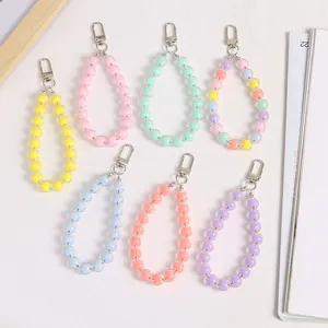 Colorful acrylic bead keychain set with silver metal lobster clasps in seven pastel colors