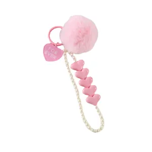 Pink plush ball keychain with pearl chain and heart charms for bags and keys