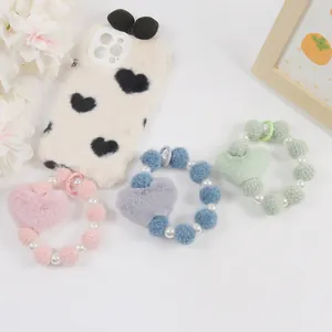 Dragonne cœur en peluche rose, bleu et vert pour téléphone ou porte-clés