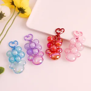 Colorful grape-shaped acrylic bubble keychains with heart-shaped metal clasps in four colors