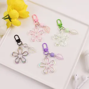 Detailed view of colorful acrylic flower keychains with leaves and lobster clasps