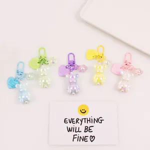 Luminous colorful resin bear charms in five pastel colors with heart and flower pendants