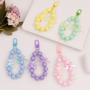 Colorful macaron beaded keychains with cute bears and bows for bags and keys