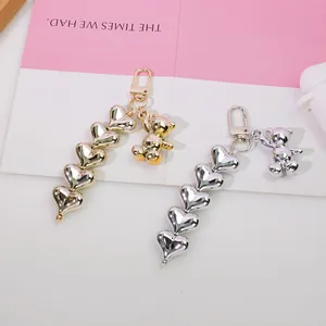 Silver and gold bear pendants with heart-shaped beads for keychains and bag charms