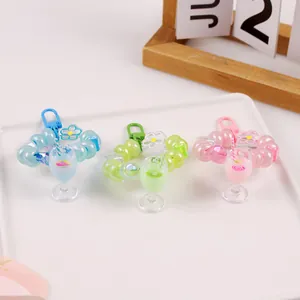 Beaded keychain with miniature milk tea cup and colorful acrylic charms in summer style