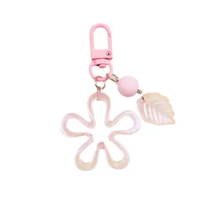 Pastel pink floral keychain with acrylic flower charm and translucent leaf for bags