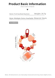 Détail porte-clés tasse de fruits avec perle cœur rouge et dimensions de 6,8 cm long