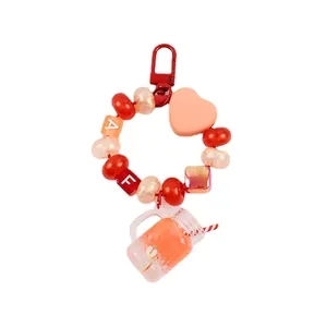 Porte-clés créatif tasse de fruits avec perles colorées, pendentif cœur et jus d'orange
