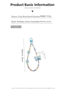 Detail view of colorful acrylic macaron beads keychain with blue bow and lobster clasp