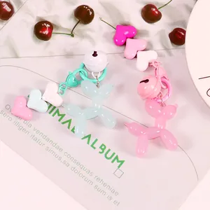 Dreamy jelly colored balloon dog keychain set with heart beads and small bell charms