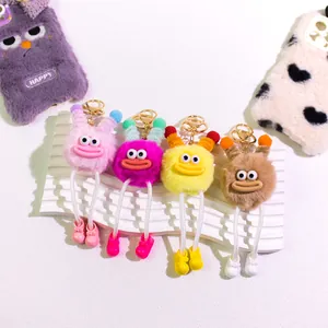 Funny plush potato monster keychains with big eyes and colorful dangling legs