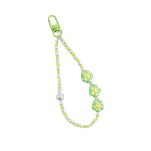 Sweet floral pearl keychain with green beads and metal clasp for bags and phone cases