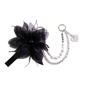 Elegant black mesh flower keychain with pearls, silver chains and heart pendant