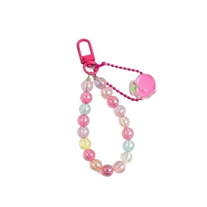 Pink beaded acrylic keychain featuring colorful round beads and a small apple pendant