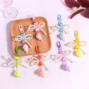 Bow-shaped pearl keychain set with heart beads in six assorted pastel colors