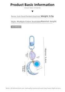Detailed view of cute acrylic cloud and moon keychain with blue snap hook and glitter moon