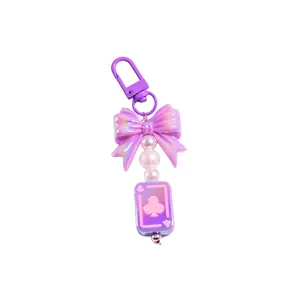 Porte-clés créatif nœud en acrylique violet avec perles et pendentif trèfle poker