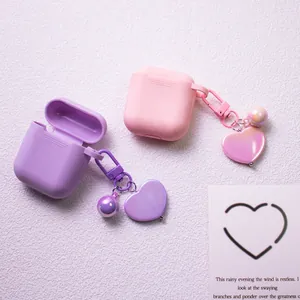 Matte silicone AirPods case in purple and pink with heart keychain and carabiner