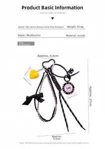 Detail view of poker chip and acrylic heart bag charm with size specifications