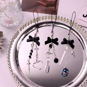 Y2K dark punk bow and cross keychain accessories with resin charms and metal chains