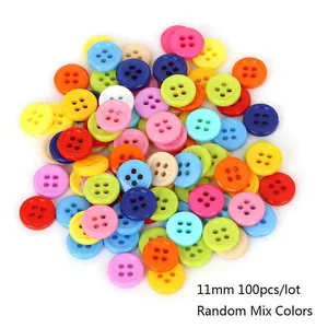 Close-up of 11mm mixed color four-hole plastic buttons for DIY sewing crafts 100pcs