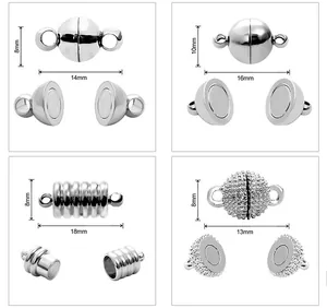 Detailed view of silver magnetic clasps for jewelry making in various sizes and shapes