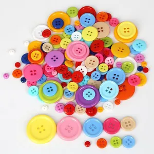 Colorful assorted round plastic buttons in various sizes and 4-hole designs for DIY crafts