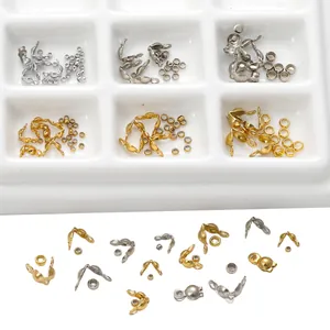 Macro detail of assorted stainless steel bead tips and crimp beads for DIY jewelry