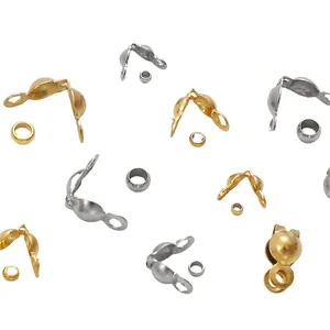 DIY jewelry kit with gold and silver shell-shaped bead tips and crimp bead connectors