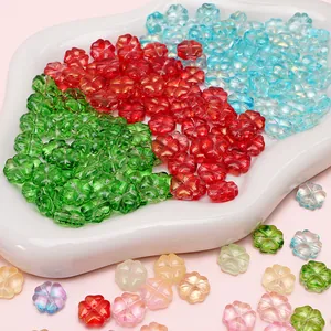 Colorful glass four-leaf clover beads in various candy colors for DIY jewelry making