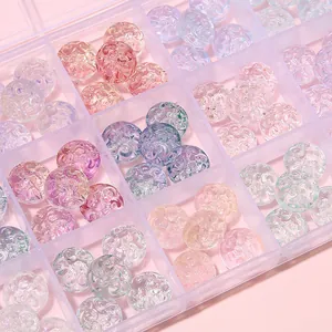 DIY jewelry kit with colorful spiral glass beads in a transparent grid storage organizer