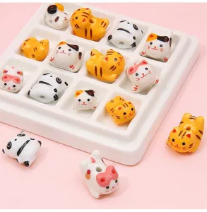 Detailed close-up of colorful ceramic animal beads with holes for DIY jewelry making