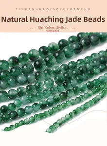 Detailed macro view of natural green jade round beads with smooth polished texture